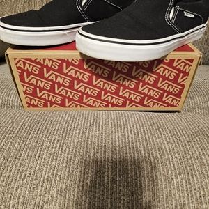 Good condition Vans black slip-ons size 8.5